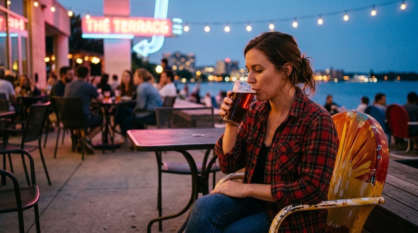 A 35mm documentary shot, rule-of-thirds with subject offset right: a woman in a vintage flannel shirt sits on a sunburst c...
