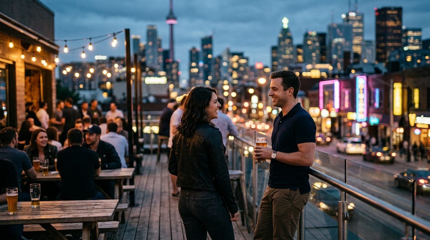 A couple stands on an elevated brewery patio in Ontario at blue hour. The woman wears a leather jacket; the man, a dark po...